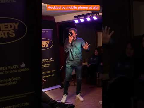 HECKLED BY MOBILE PHONE & MAN’s WIFE! Comedian V phone