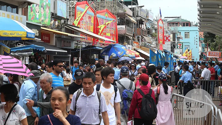 Thousands arrive for the Cheung Chau bun festival - DayDayNews