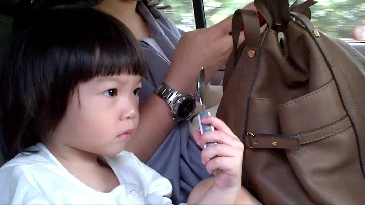 20 months old toddler "hipnotized" herself to sleep while holding up a spoon. Funny and cute!