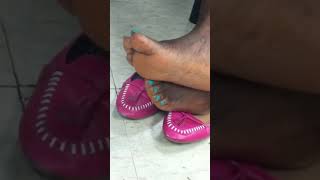 ebony candid rubbing feet