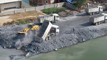 Best Skill Operator Deep Water Land Reclamation with Stone Wheel loader and Dump Truck Moving Stone