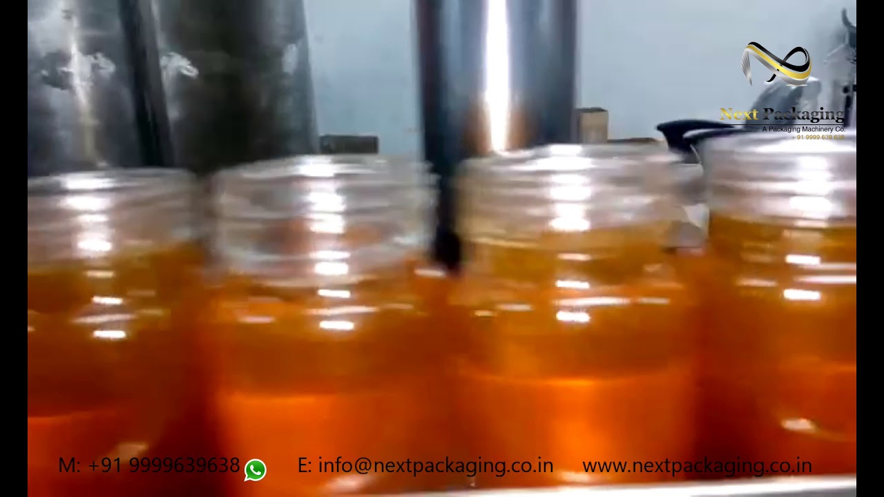 Fully Automatic Ghee/Oil Filling machine - Automatic Cap Sealing Machine - Sticker Labeling Machine