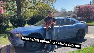 How To Remove a Spinning Lug Nut cap  stuck wheel lug nut fix