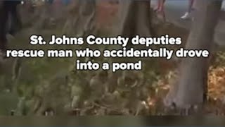 Man rescued after accidentally driving into St. Johns County pond