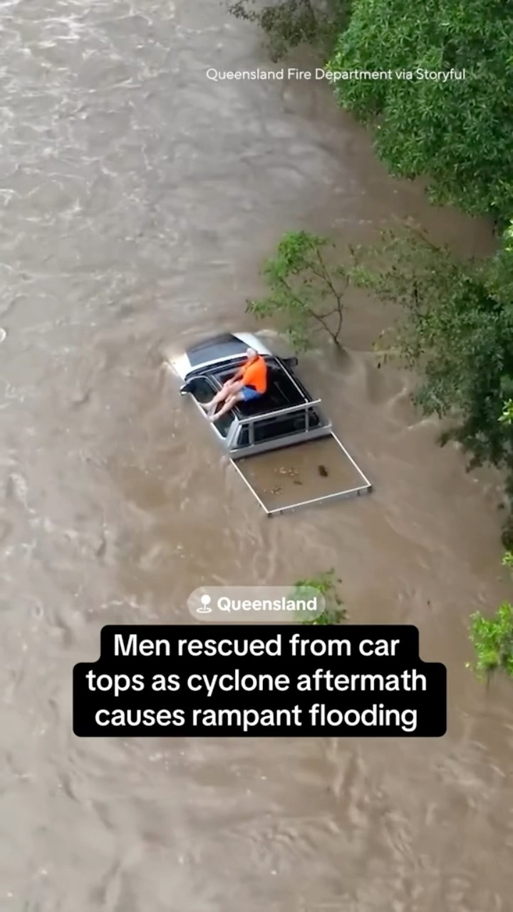 Men rescued from car tops as tropical cyclone causes flooding in Australia #shorts