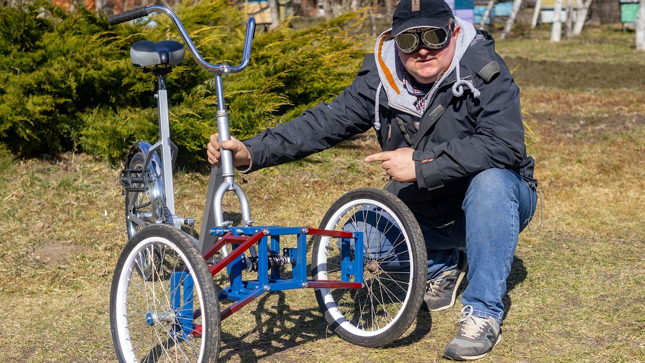 Трехколесный велосипед с двумя наклоняемыми передними колесами