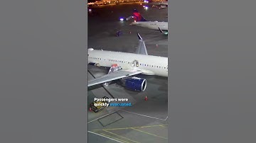 Delta plane catches fire at Seattle airport gate, prompts evacuation #Shorts