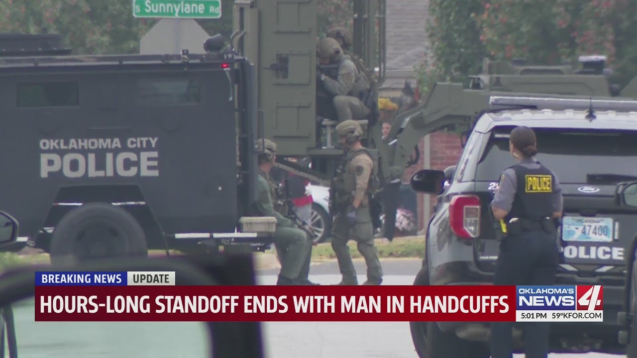 Hours-long standoff ends with man in handcuffs - YouTube