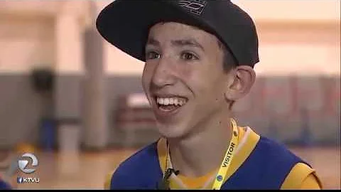 Boy overcomes physical obstacles, shoots hoops with Steph Curry