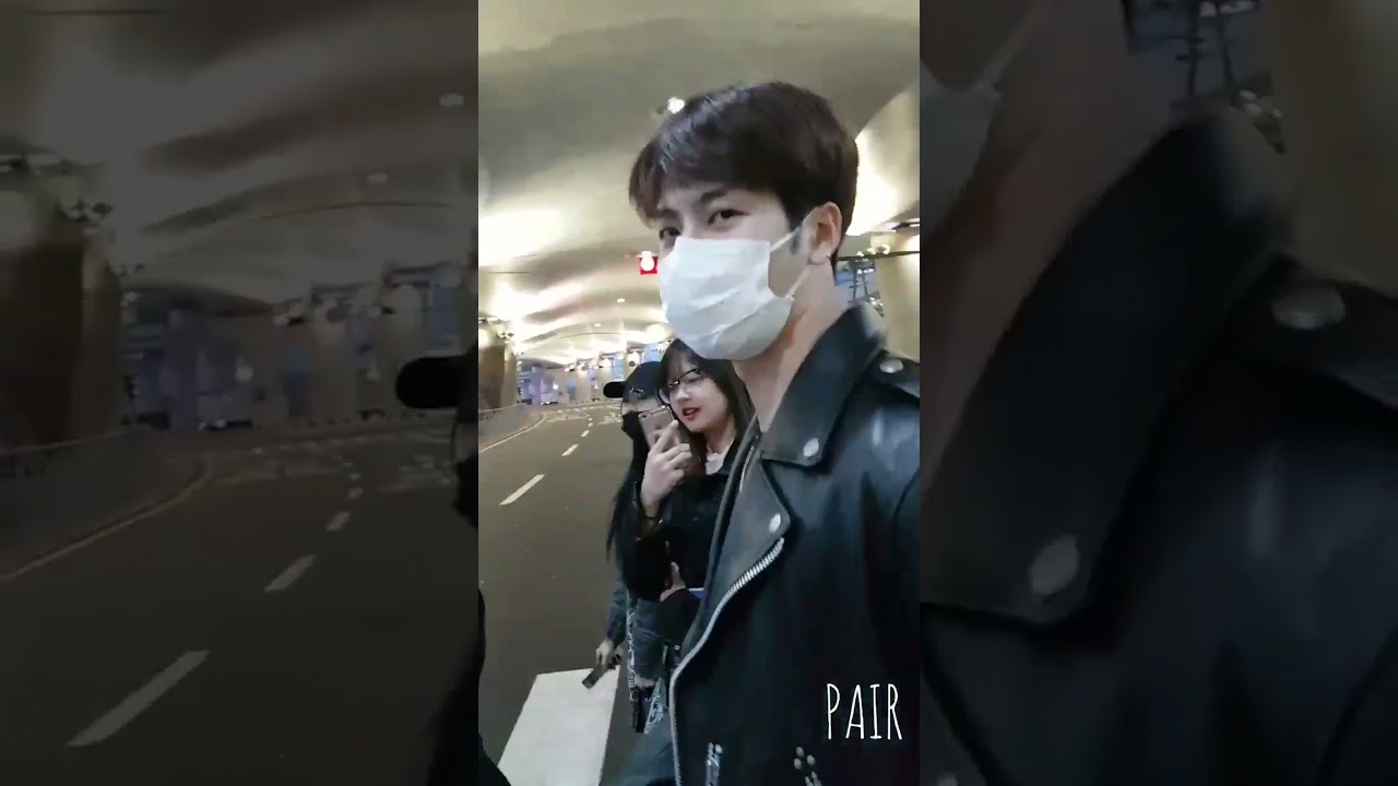 Jackson Wang casually walking with his fans