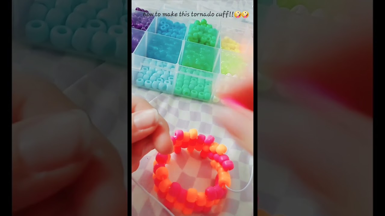 SRRY THE SHORT WAS CUT SO SHORT!!How to make a kandi tornado cuff