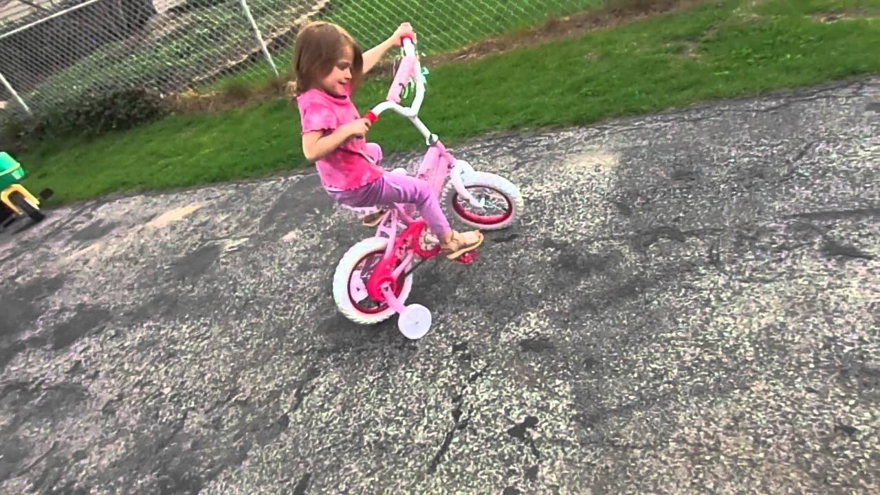 3 year old's bike with training wheels turns into an exercise bike