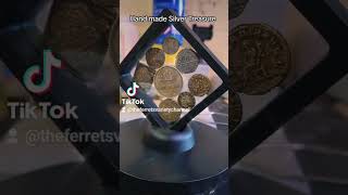 Silver casting accent coins.