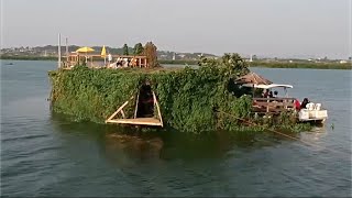Угандиец построил из мусора плавучий остров и открыл там ресторан