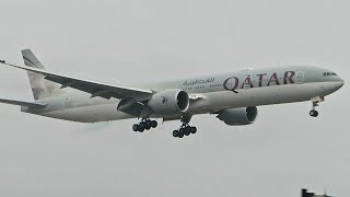 A qatar airways boeing 777-300er lands in the rain at toronto pearson
international airport. this flight was returning canadian citizens
from amritsar, india...
