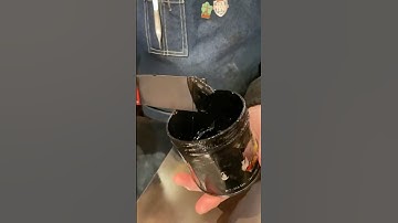 Howard prepares some ink on the ink stone and brayer to do some letterpress printing