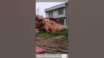 The Process Of Unloading The Bricks From The Truck