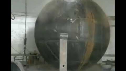 Explosively hydroforming a steel sphere