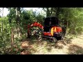 Clearing a right of way for utilities (power line) 285'. (kubota kx57, 12" bucket)