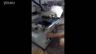 desktop screen printer printing on battery