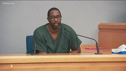 Tiffany Moss stares down husband as he takes the s...