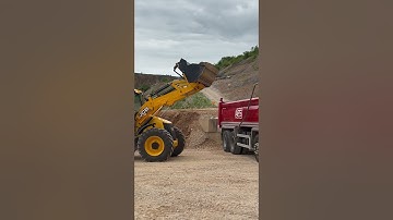 JCB 4CX backhoe loader loading a tipper truck with gravel. #jcb #heavyequipment #backhoeloader