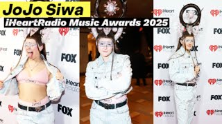 Jojo Siwa Attends Iheartradio Music Awards 2025 In Mive Wig With Its Own Keychain And Bedazzled