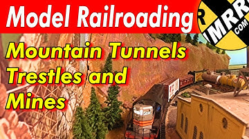 Model Railroad train ride over a huge layout 3