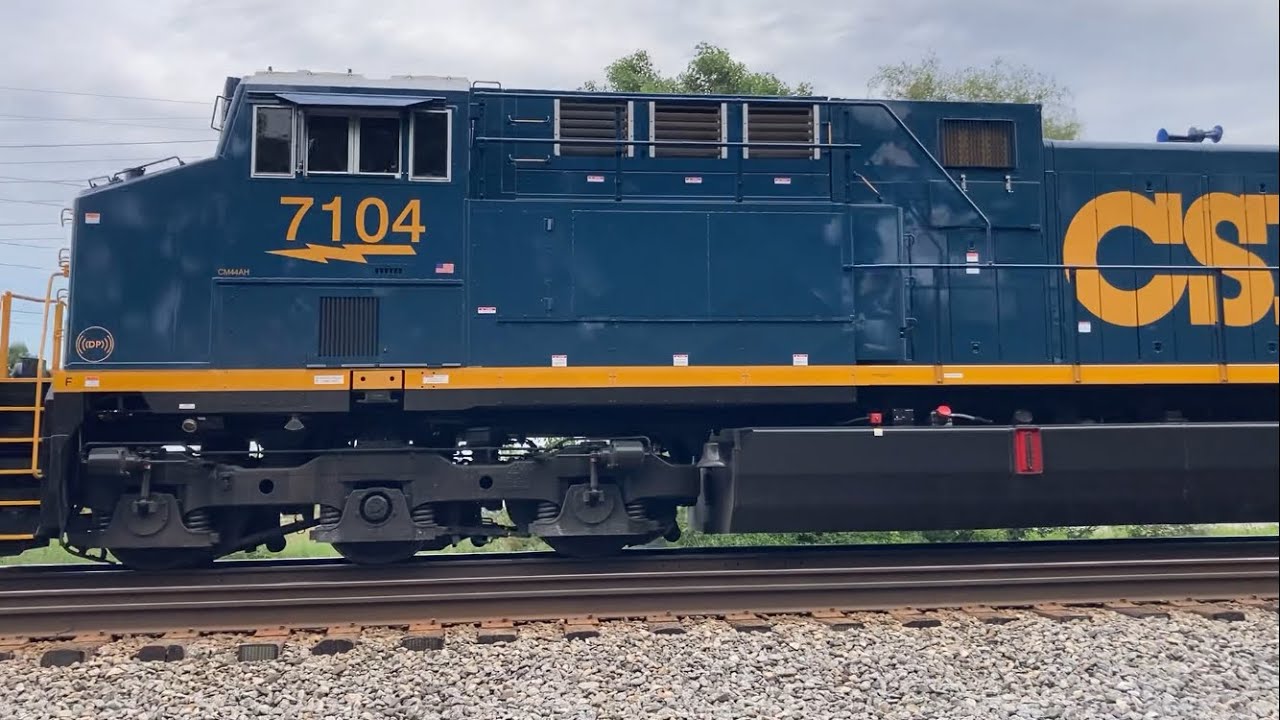 Two brand new CSX locomotives, 7104 leads the way with 7111 on the DPU ...