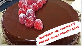 Chocolate mousse cake with mirror glaze and raspberry jelly. Pastry chef master class