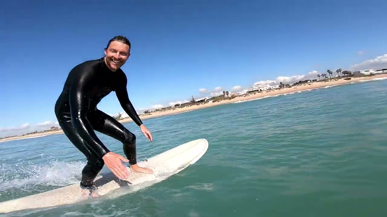 Wave surfing in El Palmar, Spain