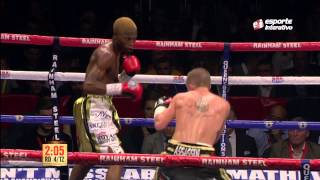 Zolani Tete knocks out Paul Butler in the eighth round and retains his title.