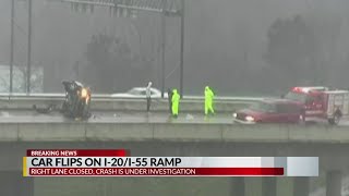 Car flips on I-20/ I-55 ramp