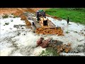 So smart driver skills with stronger KOMATSU D58P dozer pushing soil and truck dumping soil