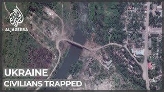 Civilians trapped in Ukraine's Donbas as key bridge destroyed screenshot 3