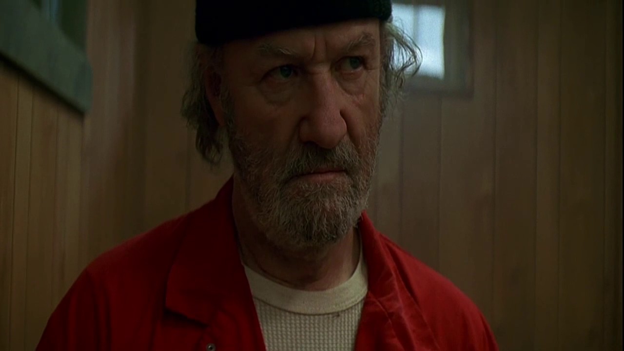 Rollie Wedge who went to the prison threatened Sam to hold his tongue on this case