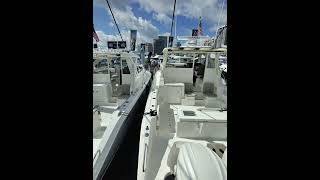 Pursuit Offshore Series – Palm Beach Boat Show Coverage | YachtBuying101.com