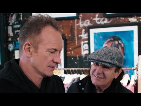 Sting & Brian Johnson hug on the Bowery on a freezing cold NYC winter's day