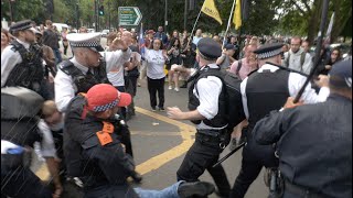 Scuffle Takes Place Between Police And Protesters At 'Medical Freedom' Demo In Clapham, London