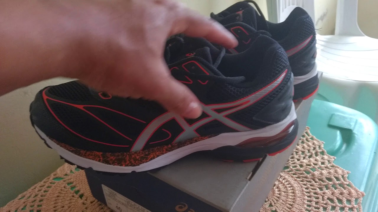 asics preto e laranja