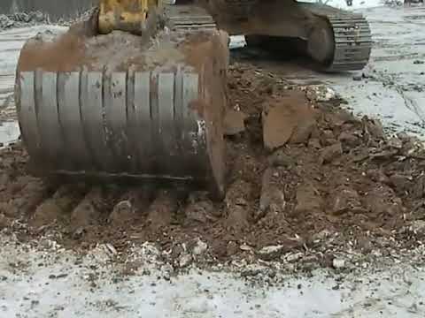 Digging frozen ground with an excavator at minus 20°C