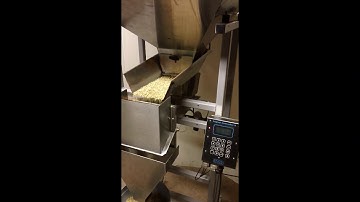 The Logical Machines Model S-4 Automatic Scale System filling Chamomile Tea.