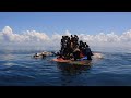 Indonesian authorities rescue stranded rohingya holding onto overturned boat  afp