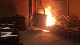 Pouring molten metal into castings at Pacific Steel Casting