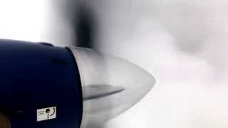 Beechcraft 1900C Left Engine in the clouds