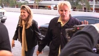 Gary Busey And Fiance Steffanie Sampson Hold Hands At LAX