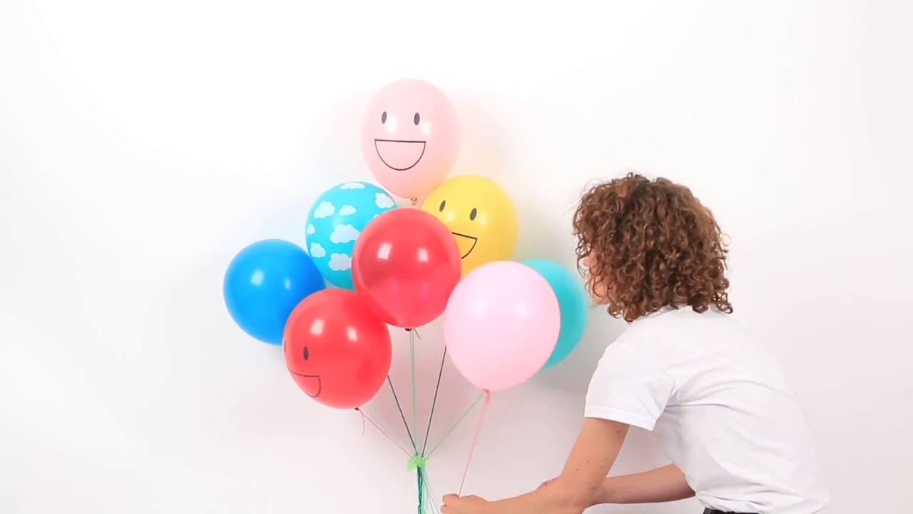 Comment réaliser une grappe de ballons à l'hélium ? - YouTube