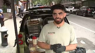 Crowds flock to 'New York City's smallest pizzeria' in trunk of smart car