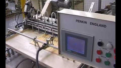 Perkin Composite Can Labelling Machine - Core Labeller