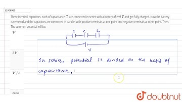 Three identical capacitors, each of capacitance `C`, are connected in series with a battery of e...